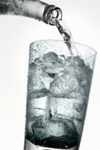 Refreshing drink being poured into a glass.jpg